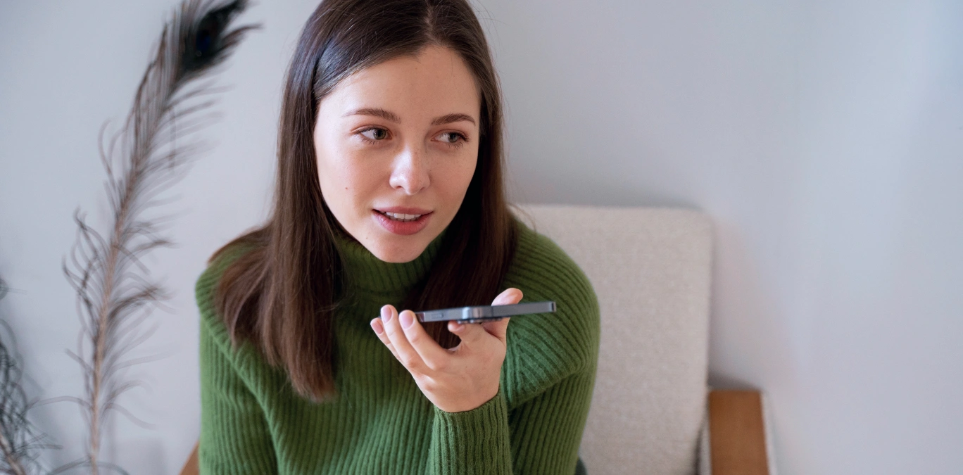 User interacting with AI assistant through voice chat and camera on mobile screen